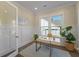 Bright office space features wainscoting, modern desk, and plenty of natural light at 4209 Royal Harbor Rd, Hollywood, SC 29449