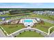 Aerial view of community pool, clubhouse, and surrounding homes at 4310 Cotton Flat Rd, Summerville, SC 29485