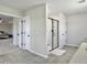 Modern bathroom featuring a frameless glass shower, white cabinetry and tile flooring at 4310 Cotton Flat Rd, Summerville, SC 29485