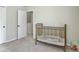 Bright Bedroom featuring a vintage crib, plush toys, and natural light at 4310 Cotton Flat Rd, Summerville, SC 29485