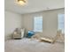 Bright bonus room with a chair, equipment and lots of natural light at 4310 Cotton Flat Rd, Summerville, SC 29485