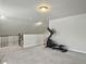 Lofted bonus room featuring neutral decor, carpet flooring, and access to storage at 4310 Cotton Flat Rd, Summerville, SC 29485