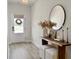 Stylish entryway with wood floors, a decorative console table and an accent mirror at 4310 Cotton Flat Rd, Summerville, SC 29485