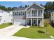 Beautiful two-story home with a welcoming porch and well-kept landscaping at 4310 Cotton Flat Rd, Summerville, SC 29485