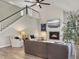 Comfortable living room with hardwood floors, fireplace and large windows for plenty of natural light at 4310 Cotton Flat Rd, Summerville, SC 29485