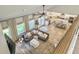 Open living room with vaulted ceilings and views of the kitchen, great for entertaining Gathering and friends at 4310 Cotton Flat Rd, Summerville, SC 29485