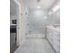 Elegant bathroom featuring tiled walk-in shower, double vanity and linen storage at 4332 John Hatch Dr, Johns Island, SC 29455