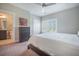 Bedroom with view of the en suite, dresser and natural light at 4332 John Hatch Dr, Johns Island, SC 29455