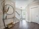 Well-decorated foyer with hardwood floors, a mirror, console table, and a view of the front door at 4332 John Hatch Dr, Johns Island, SC 29455