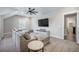 Cozy living room featuring a ceiling fan, plush seating, and a neutral color palette at 4332 John Hatch Dr, Johns Island, SC 29455