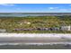 An aerial view showcasing the complex's beachfront location and surrounding landscape at 4338 Sea Forest Dr, Kiawah Island, SC 29455