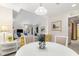 Open concept dining area with views to the living area and an adjacent sitting area at 4338 Sea Forest Dr, Kiawah Island, SC 29455