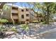 Attractive condominium complex featuring multiple units with shingle siding, lovely landscaping, and mature trees at 4338 Sea Forest Dr, Kiawah Island, SC 29455