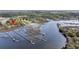 Real estate overhead view of a home with docks along the waterway at 4584 Olde Smoak House Rd, Meggett, SC 29449