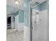Bathroom featuring a glass enclosed shower and access to additional rooms at 4584 Olde Smoak House Rd, Meggett, SC 29449