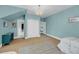 Bedroom with large bed and access to multiple rooms at 4584 Olde Smoak House Rd, Meggett, SC 29449