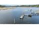 Waterfront dock on a scenic river offers access for boating, fishing, and enjoying the surrounding natural beauty at 4584 Olde Smoak House Rd, Meggett, SC 29449
