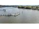 Dock with ladder offers direct access to the waterfront and opportunities for recreation and relaxation at 4584 Olde Smoak House Rd, Meggett, SC 29449