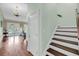 Hallway view of stairs leading up to other rooms at 4584 Olde Smoak House Rd, Meggett, SC 29449