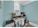 Compact kitchenette with stainless steel appliances and a granite countertop finish at 4584 Olde Smoak House Rd, Meggett, SC 29449