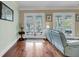 Cozy living room with access to an outdoor balcony at 4584 Olde Smoak House Rd, Meggett, SC 29449