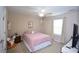 Cozy bedroom features a ceiling fan, plush carpet, and plenty of natural light at 470 Spectrum Rd, Summerville, SC 29486