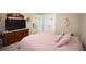 Comfortable bedroom with plush carpet, pink bedding, and double-door closet at 470 Spectrum Rd, Summerville, SC 29486