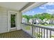 Beautiful porch view of the neighborhood, showcasing well-maintained lawns and charming home exteriors at 5035 Gum Tree Ln, Johns Island, SC 29455