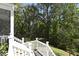 This deck overlooks a beautifully maintained backyard with lush trees, creating a tranquil and scenic outdoor setting at 5035 Gum Tree Ln, Johns Island, SC 29455