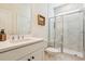 Elegant bathroom with modern vanity, sleek fixtures, and a glass-enclosed shower with stylish tile work at 5035 Gum Tree Ln, Johns Island, SC 29455