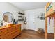 Nicely decorated bedroom with fun decorations, bunk bed and a wooden dresser at 5035 Gum Tree Ln, Johns Island, SC 29455