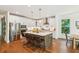 Modern kitchen featuring a center island, stainless steel appliances, and wood floors at 5035 Gum Tree Ln, Johns Island, SC 29455