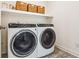 Clean laundry room featuring a new washer and dryer set and decorative tile flooring at 5035 Gum Tree Ln, Johns Island, SC 29455
