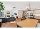Spacious living area with a fireplace, TV, and seamless connection to the kitchen at 5035 Gum Tree Ln, Johns Island, SC 29455