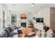 Comfortable living room showcasing a fireplace, TV, and modern decor at 5035 Gum Tree Ln, Johns Island, SC 29455