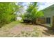 Lawn of backyard featuring green grass, small garden and privacy fence at 507 Stinson Dr # 7F, Charleston, SC 29407