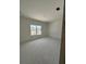 Bright bedroom featuring a large window, offering a comfortable and customizable space at 625 Marsh Cove Cir, Summerville, SC 29486