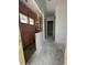 Hallway with views into rooms under construction, highlighting future layout and design potential at 625 Marsh Cove Cir, Summerville, SC 29486