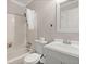 Clean bathroom with tub/shower combo, vanity with sink, and white tile surround at 65 University Dr, Ladson, SC 29456