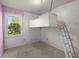 Cozy bedroom with built-in loft bed, ladder access, and natural light from a window at 65 University Dr, Ladson, SC 29456