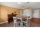 Cozy dining area featuring a table with chairs, a piano and natural lighting at 65 University Dr, Ladson, SC 29456