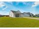 Charming single-story home with well-manicured lawn and attached two-car garage, perfect for Gathering living at 706 Squire Pope Rd, Summerville, SC 29486