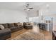 Expansive living area with high ceilings seamlessly blends into the kitchen and dining space for easy living at 706 Squire Pope Rd, Summerville, SC 29486