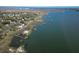 Expansive aerial view of waterfront homes with private docks extending into the serene coastal waters at 731 Pitt St, Mount Pleasant, SC 29464