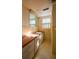 Bathroom with vanity and yellow tile plus natural light from the window at 731 Pitt St, Mount Pleasant, SC 29464