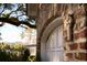 Close up on the brick detailing of the exterior of the home showing a religious cross on the archway at 731 Pitt St, Mount Pleasant, SC 29464