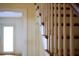 Detailed view of a wooden staircase with white spindles, showcasing the craftsmanship and design at 731 Pitt St, Mount Pleasant, SC 29464