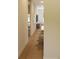 Hallway view features bar stools and a view to other rooms in the house and providing connectivity at 7424 Indigo Palms Way, Johns Island, SC 29455