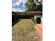 Large backyard with above ground pool and partially fenced in yard at 7724 Linsley Dr, North Charleston, SC 29418