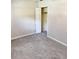 Bedroom featuring carpet floors, neutral wall color, and a closet with folding doors at 7724 Linsley Dr, North Charleston, SC 29418